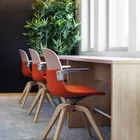 Con III chairs with armrests and oak base Fora Form