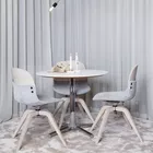 Con III chairs with white washed oak veneere back and swivel base and Next table Fora Form