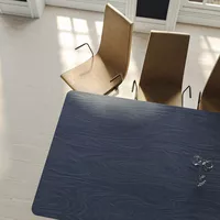 Fora Form Kvart table dark sky birchply Clint chairs cropped