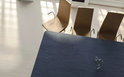 Fora Form Kvart table dark sky birchply Clint chairs cropped