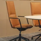 A Fjell chair with armrest and high backrest from Fora Form