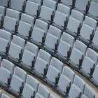 Arena stol med medium rygg i et buet auditorium Fora Form