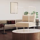 Kove chair with high grid and a sofa with low grid from Fora Form