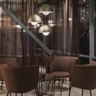 Tind chairs and Root table at Fora Form