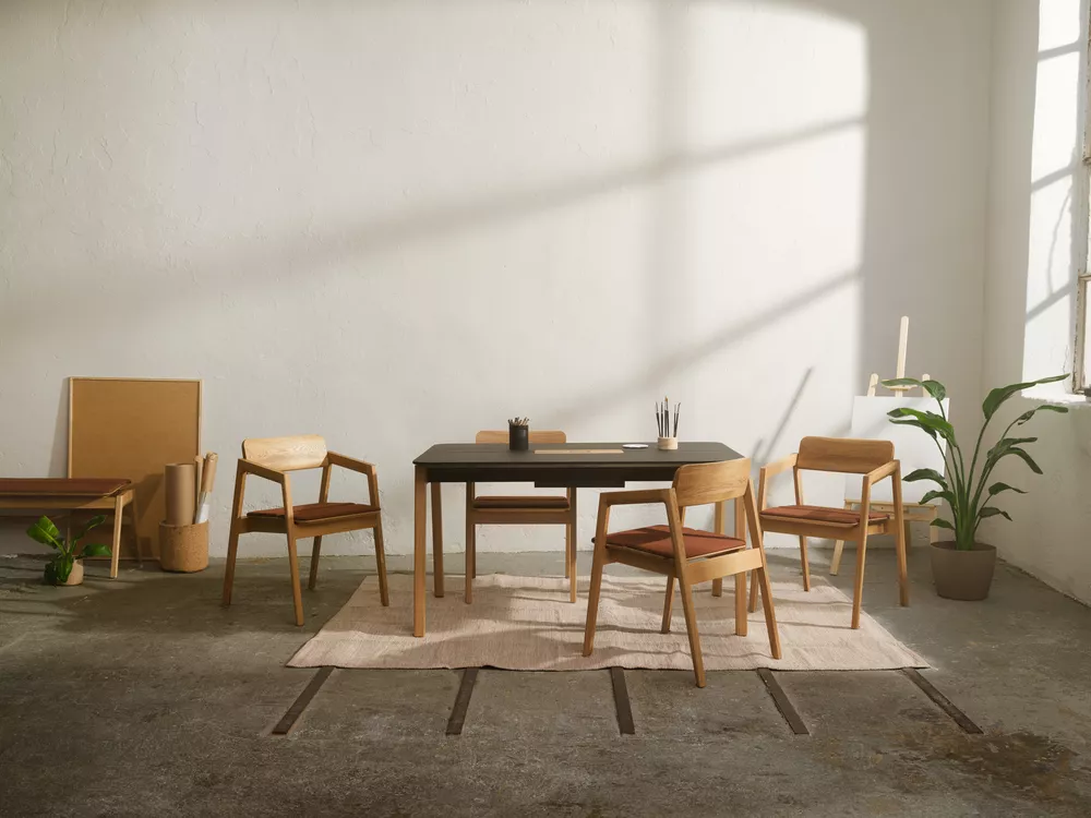 Knekk chair with armrest and cushions and Knekk Wood table from Fora Form