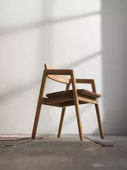 Knekk chair with armrest and cushion from Fora Form