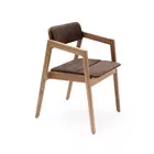 Knekk chair in oak fixed seat and back cushions with armrest from Fora Form